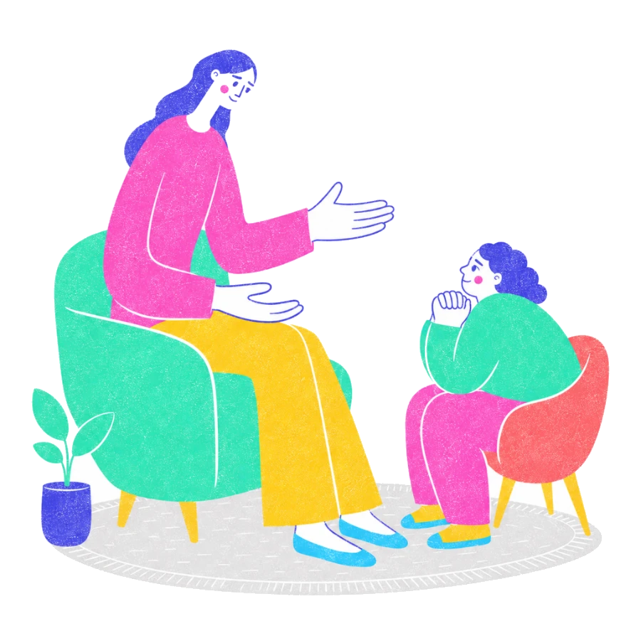Fenweh: a therapist and client seated facing each other in a warm room, illustrating one-to-one individual therapy